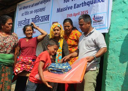 Trekking Mart leader distributing relief materials